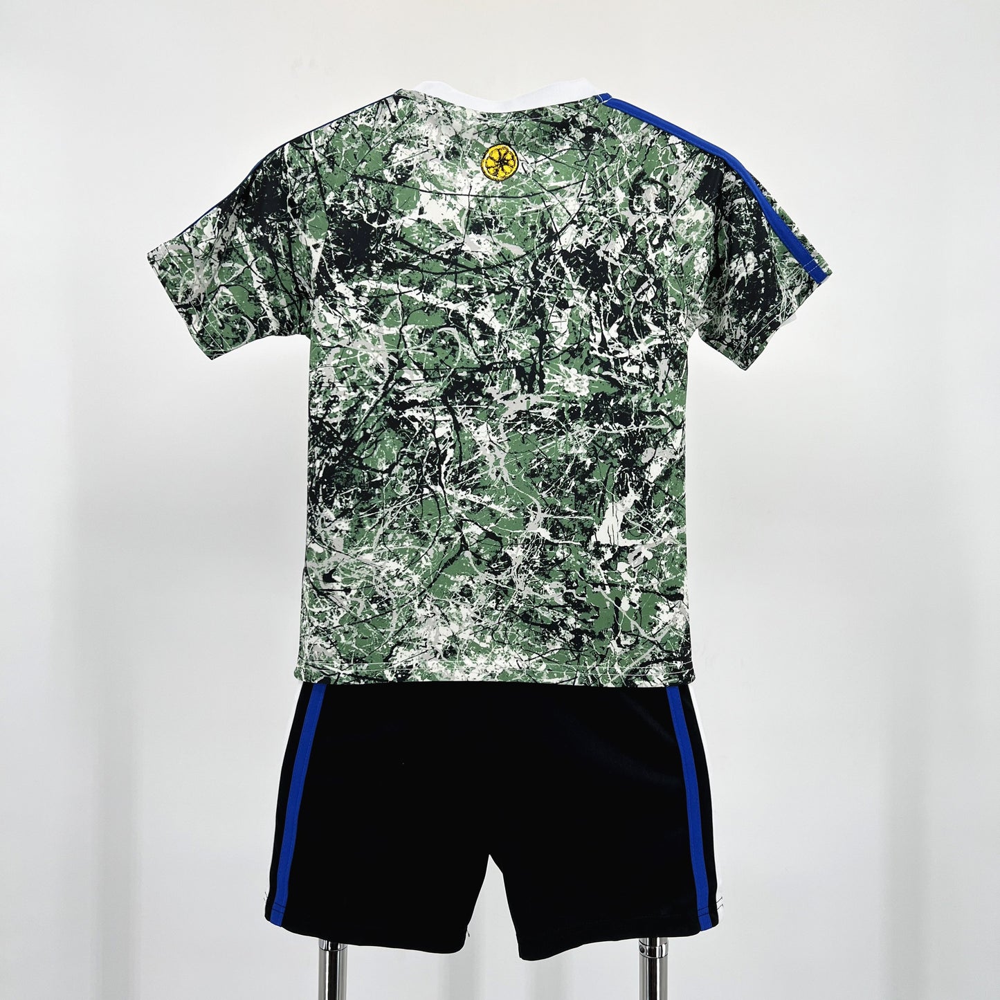 MANCHESTER UNITED EDIZIONE SPECIALE PIETRA ROSA 24/25 SET PER BAMBINI