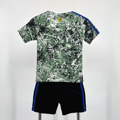 MANCHESTER UNITED EDIZIONE SPECIALE PIETRA ROSA 24/25 SET PER BAMBINI